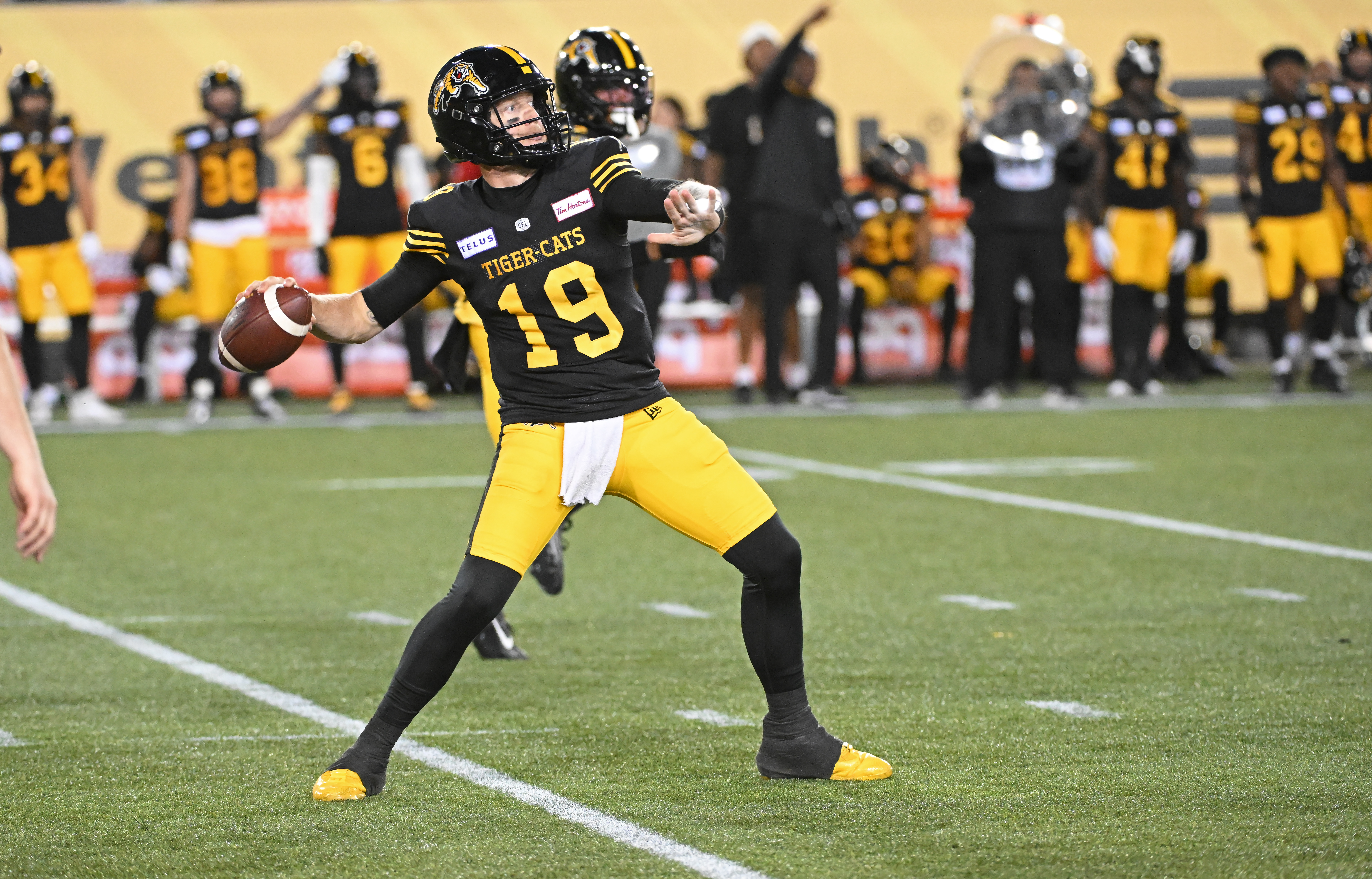 Hamilton Tiger-Cats quarterback Bo Levi Mitchell throws a touchdown pass in the third quarter against the Saskatchewan Roughriders. We expect a lot of points in our Tiger-Cats vs. Redblacks Prediction.