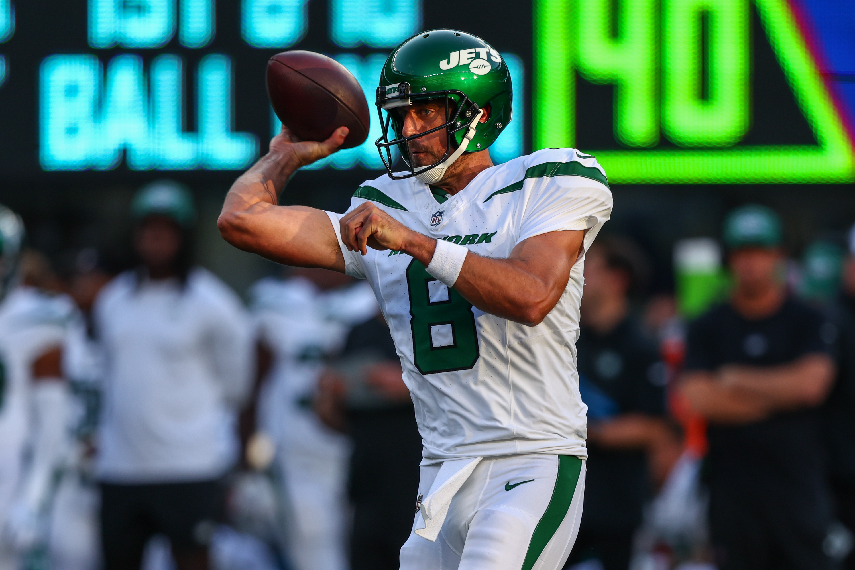 New York Jets quarterback Aaron Rodgers throws a pass against the New York Giants during the first half at MetLife Stadium. Rodgers leads the 2024-25 NFL Comeback Player of the Year Odds.