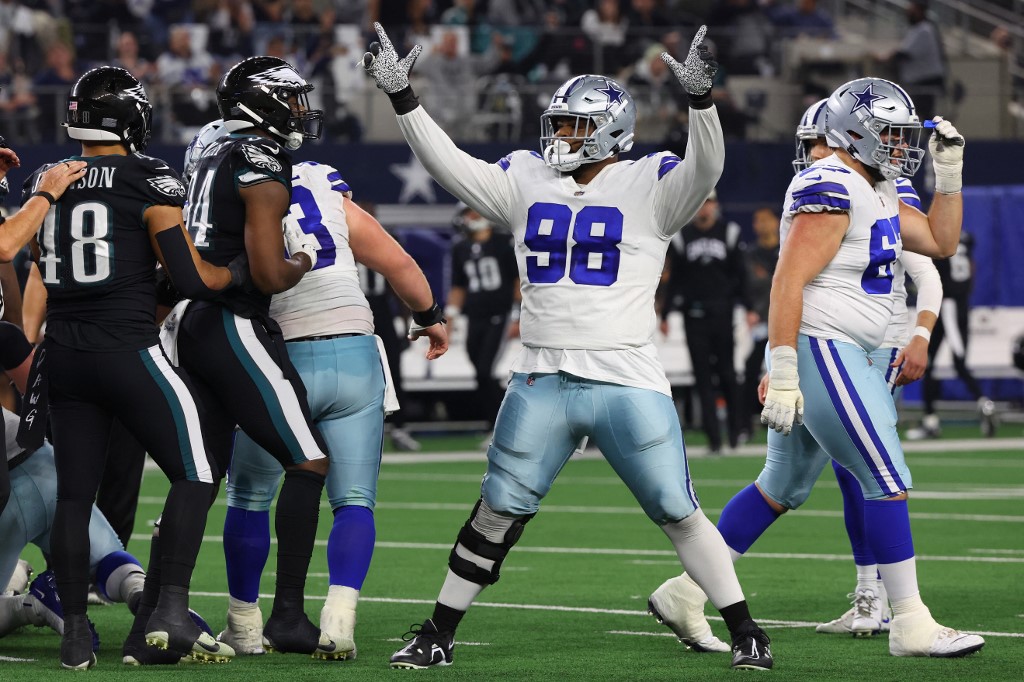 Quinton Bohanna #98 of the Dallas Cowboys celebrates a field goal as we look at our NFC East betting preview