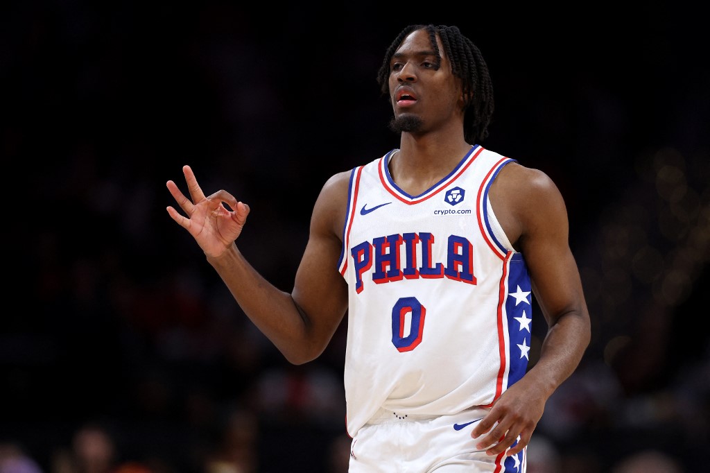 Tyrese Maxey of the Philadelphia 76ers celebrates after scoring a 3-pointer against the Washington Wizards during the second half at Capital One Arena as we look at our 76ers Celtics BetRivers promo code.