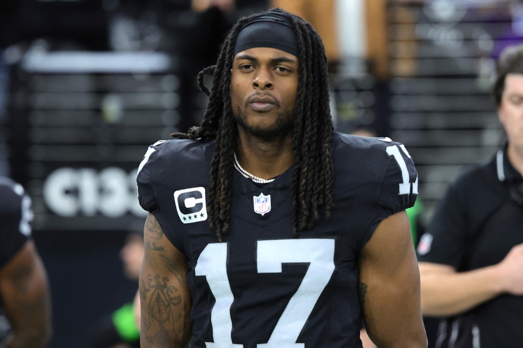 Davante Adams of the Las Vegas Raiders looks on before the game against the Minnesota Vikings at Allegiant Stadium as we look at our bet365 promo code for Chargers-Raiders.