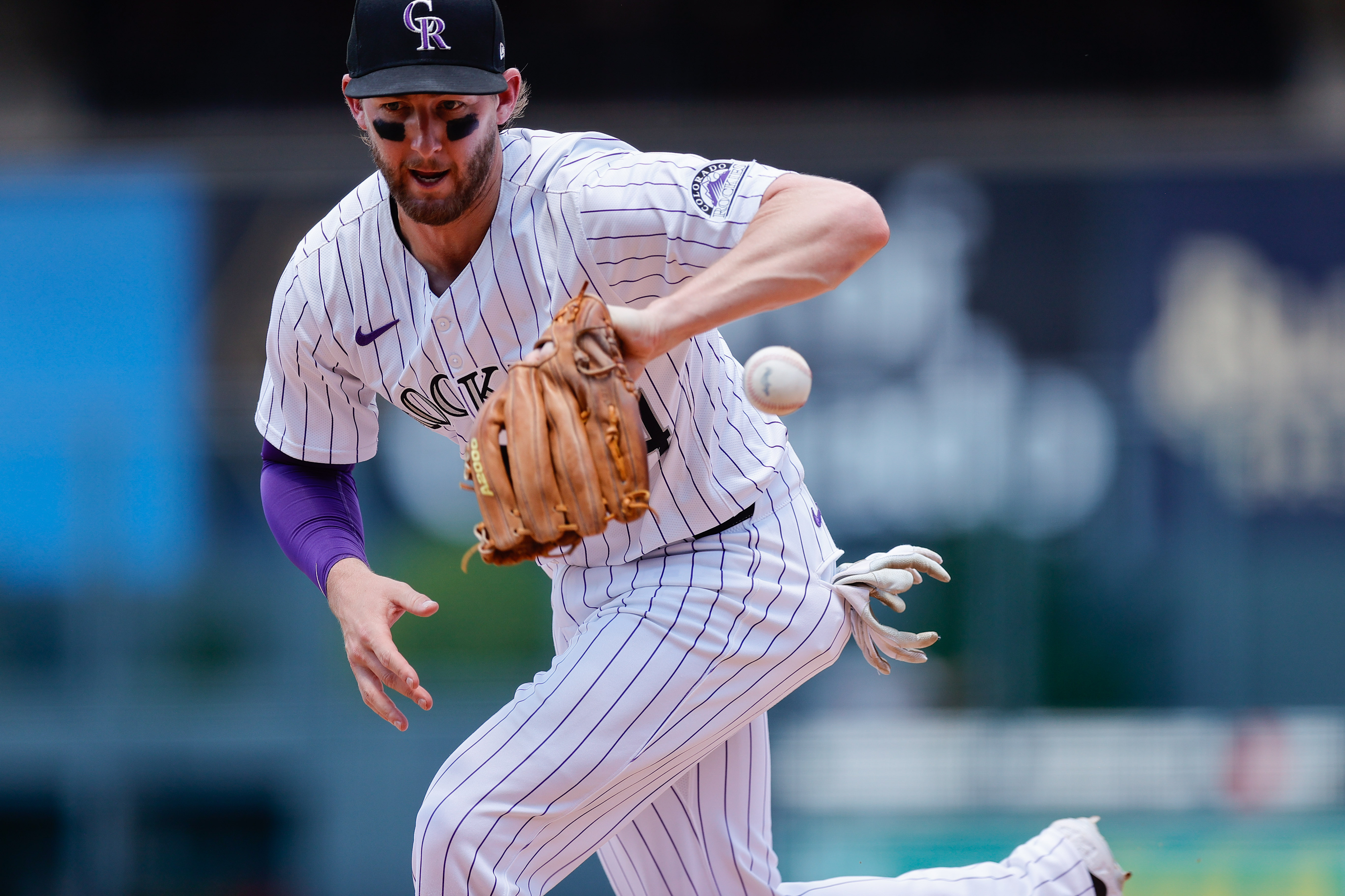 Colorado Rockies third baseman Ryan McMahon bobbles the ball as we look at reaction to Colorado and Michigan sending cease-and-desist letters to Bovada