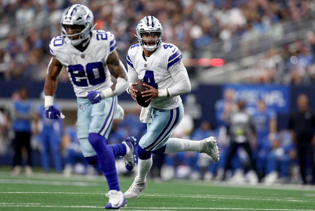 Dak Prescott of the Dallas Cowboys scrambles with the ball as we share our top Cowboys vs. Chargers SGP predictions for MNF.