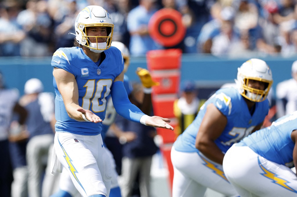 Justin Herbert of the Los Angeles Chargers reacts toward the sidelines during the first quarter against the Tennessee Titans, and we offer new U.S. bettors our exclusive bet365 bonus code for Chargers vs. Jets.