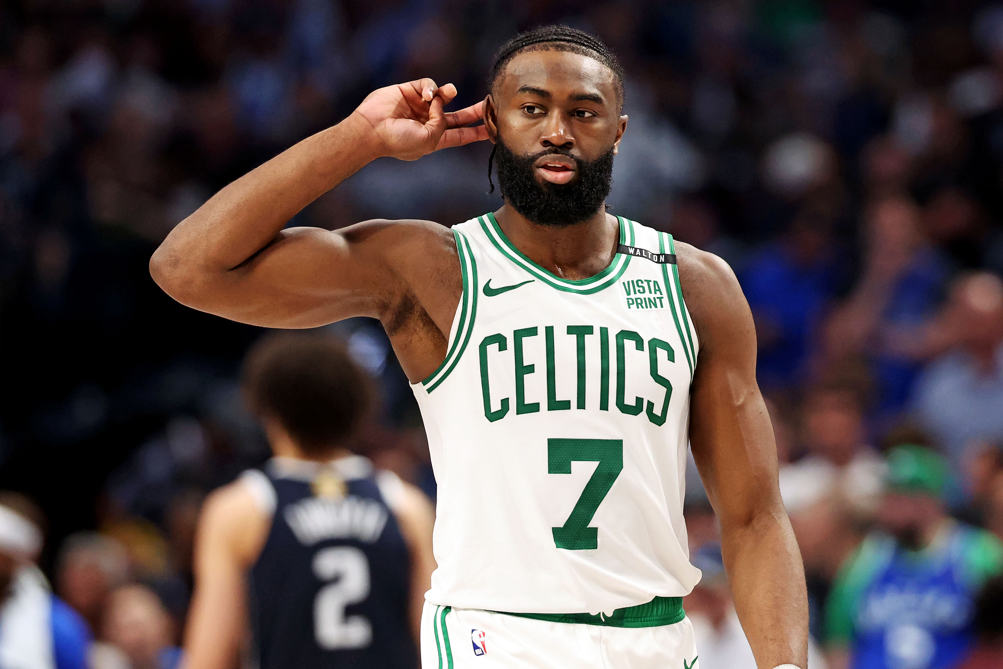 Boston Celtics guard Jaylen Brown reacts to the crowd as we look at some New Hampshire sports betting financials for bettors betting on the Boston Celtics during the 2024 NBA Postseason