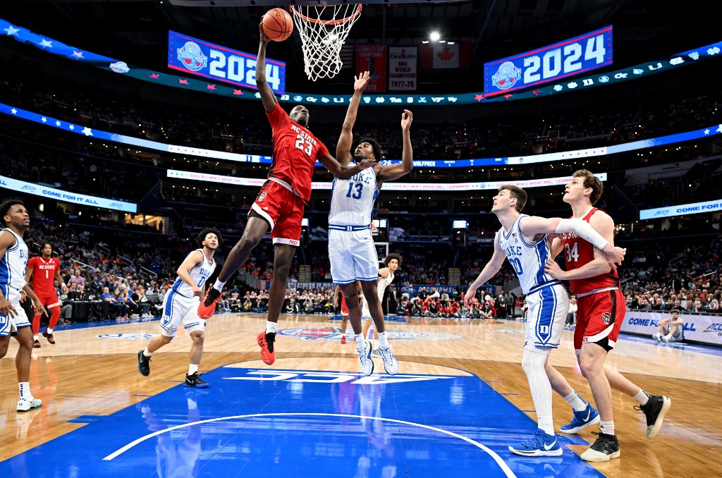 Mohamed Diarra #23 of the North Carolina State Wolfpack dunks the ball as we look at our DraftKings North Carolina promo code