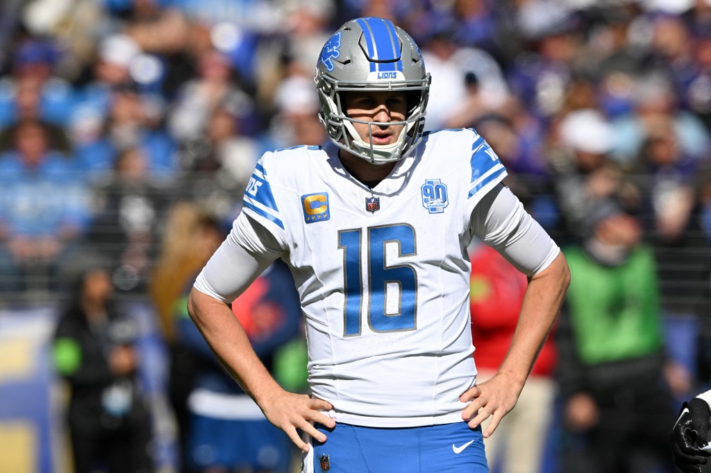 Jared Goff #16 of the Detroit Lions looks on in the first quarter as we offer our top Jared Goff NFL player props for Raiders vs. Lions based on the top NFL odds.