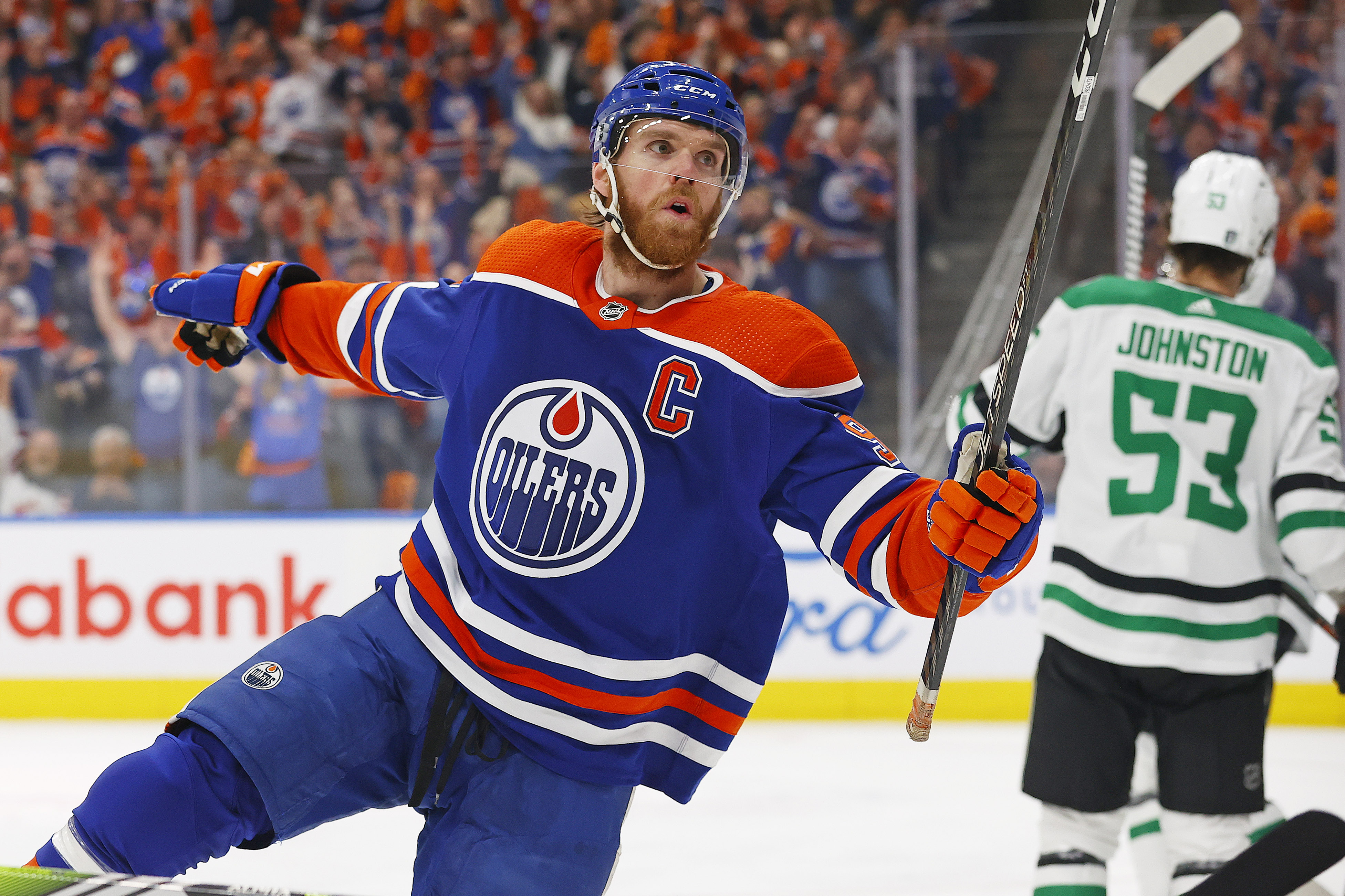 Edmonton Oilers forward Connor McDavid celebrates after scoring a goal as we look at our top Oilers vs. Panthers prediction