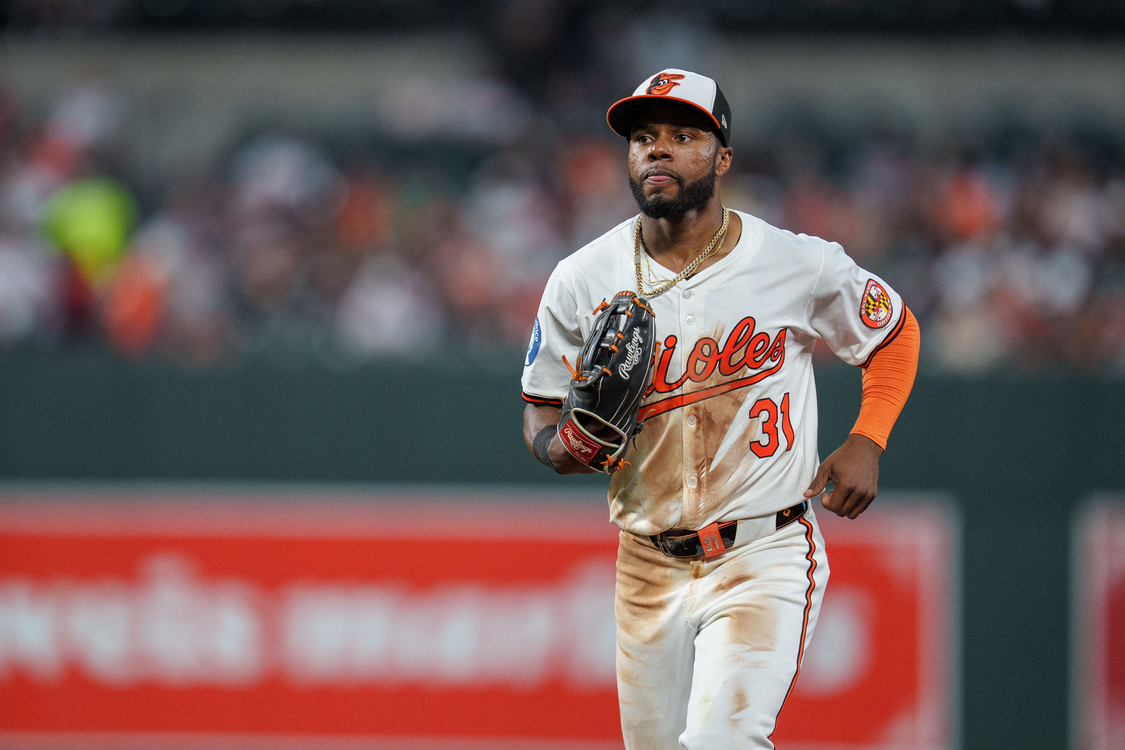 Baltimore Orioles outfielder Cedric Mullins jogs to the dug out as we look at Betr joining the Maryland sports betting landscape.