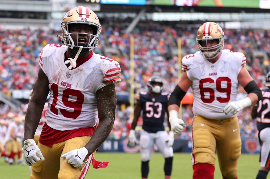 Deebo Samuel of the San Francisco 49ers celebrates a touchdown against the Chicago Bears as we look at our best 49ers-Eagles prediction.