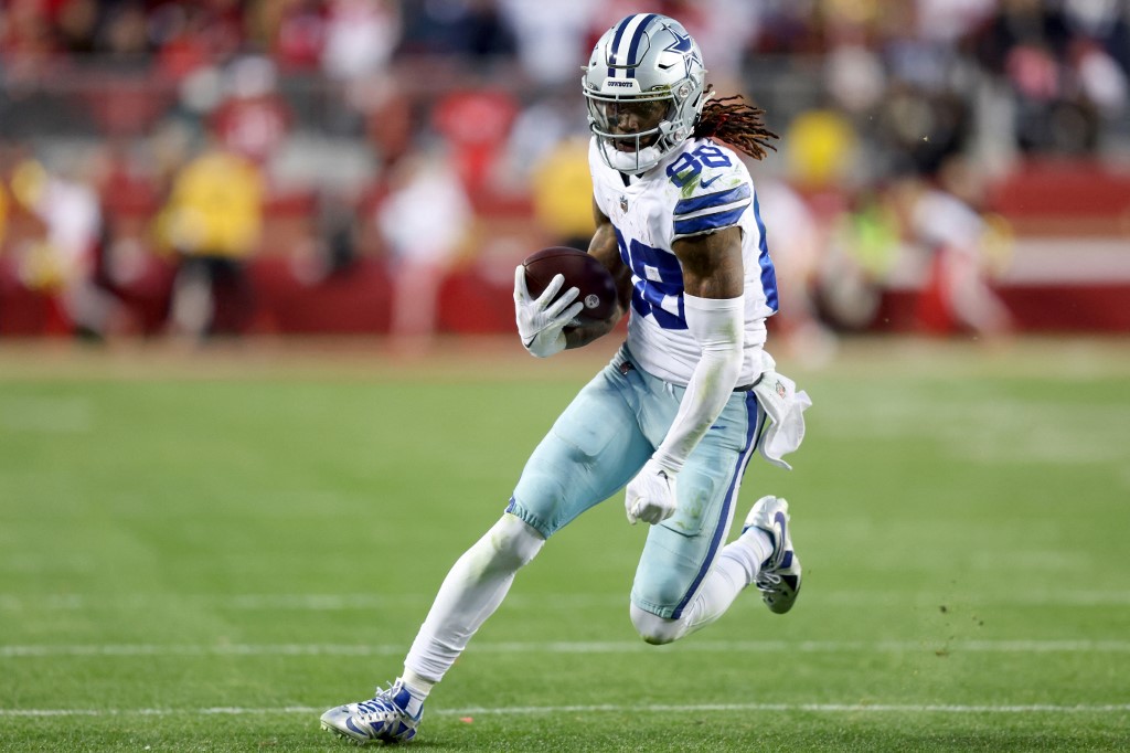 CeeDee Lamb of the Dallas Cowboys carries the ball against the San Francisco 49ers as we share our top Cowboys-Chargers bonus code.