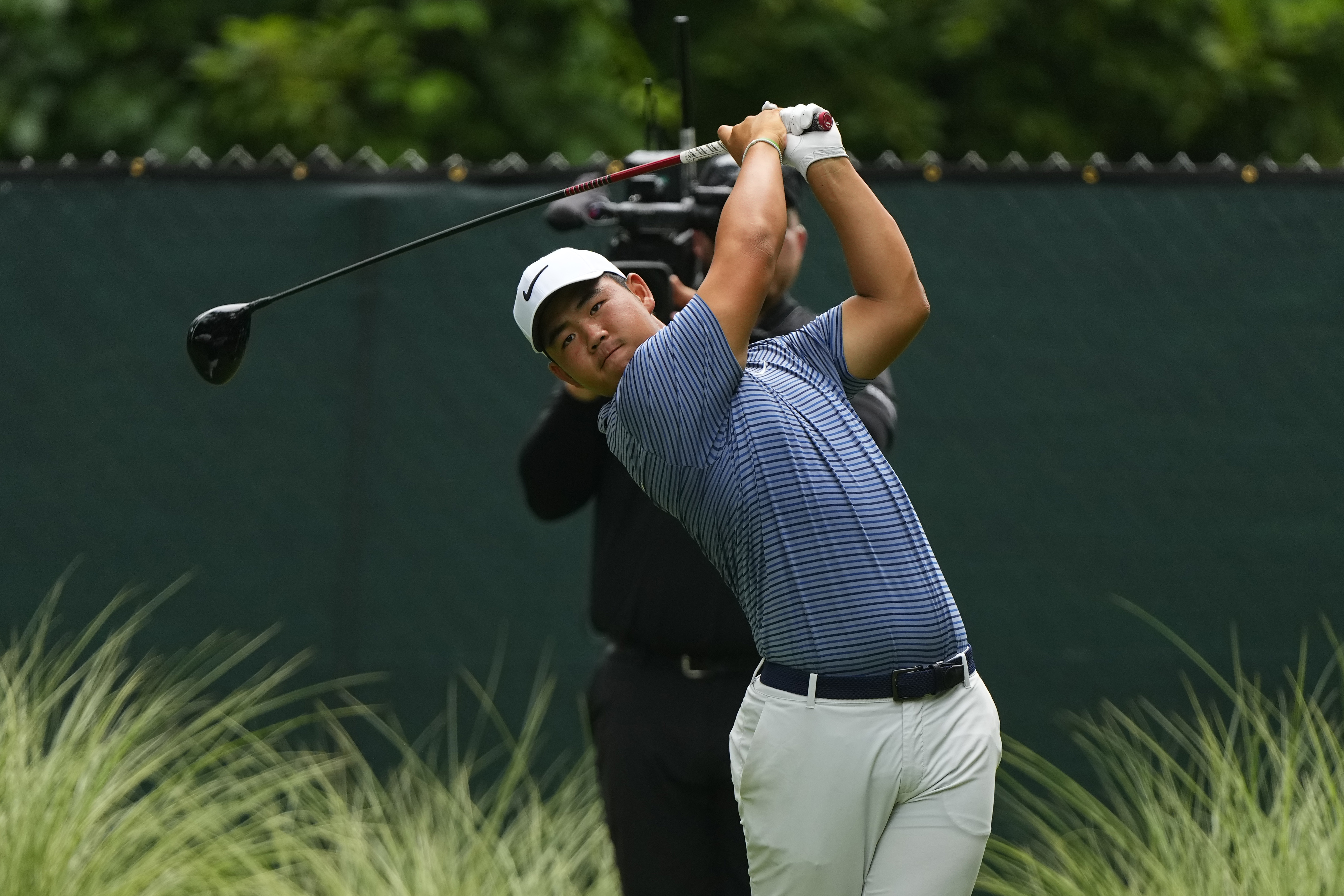 Tom Kim hits from the tee on the fourth hole as we look at the Scottish Open odds and our expert picks