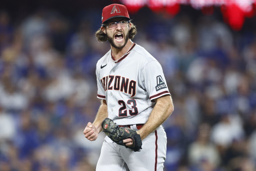 Zac Gallen of the Arizona Diamondbacks reacts after striking out Freddie Freeman of the Los Angeles Dodgers as we look at the latest from Arizona sports betting.