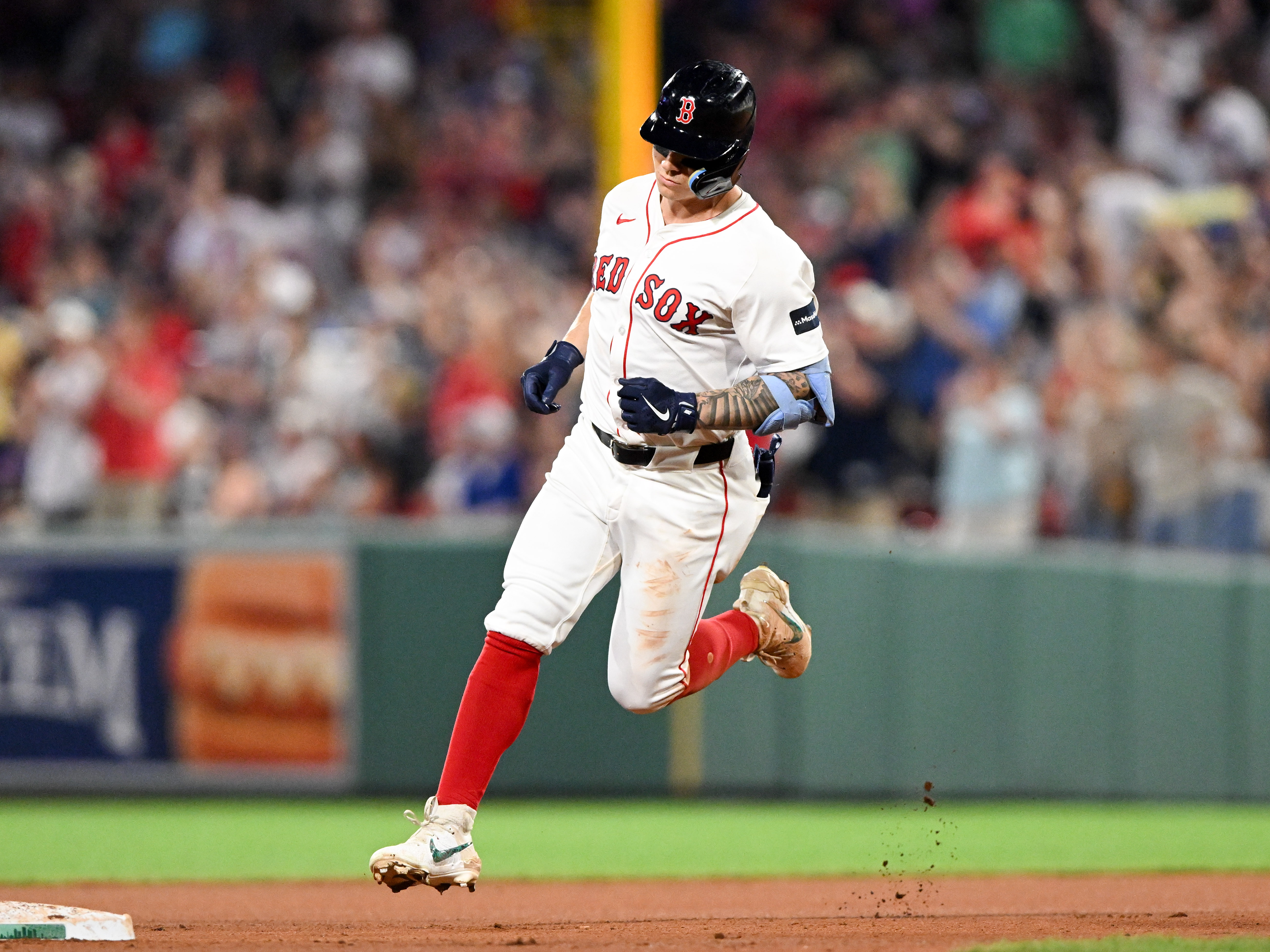 Boston Red Sox left fielder Tyler O'Neill runs the bases as we look at the Bally Bet launch in Massachusetts.