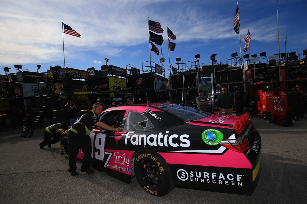 Crew members push the #19 Surface/Fanatics Toyota as we look at the details surrounding the Fanatics Underscoreg and Casino launch in Pennsylvania.