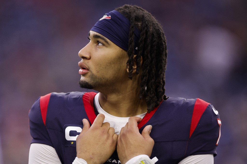 C.J. Stroud #7 of the Houston Texans looks on during the second half of a game against the Tennessee Titans as we look at the NFL playoff trends for quarterbacks making their first postseason start ahead of Wild Card Weekend.