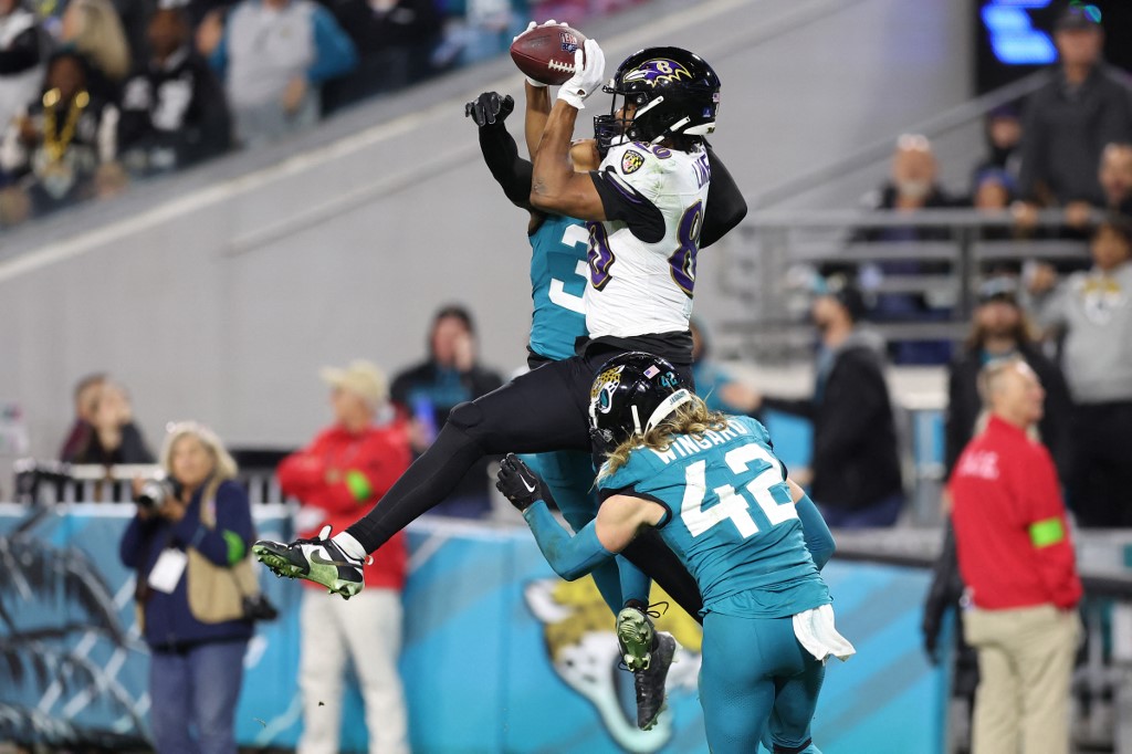 Isaiah Likely #80 of the Baltimore Ravens makes a reception as we look at our Ravens vs. 49ers NFL player props for MNF on Christmas Day