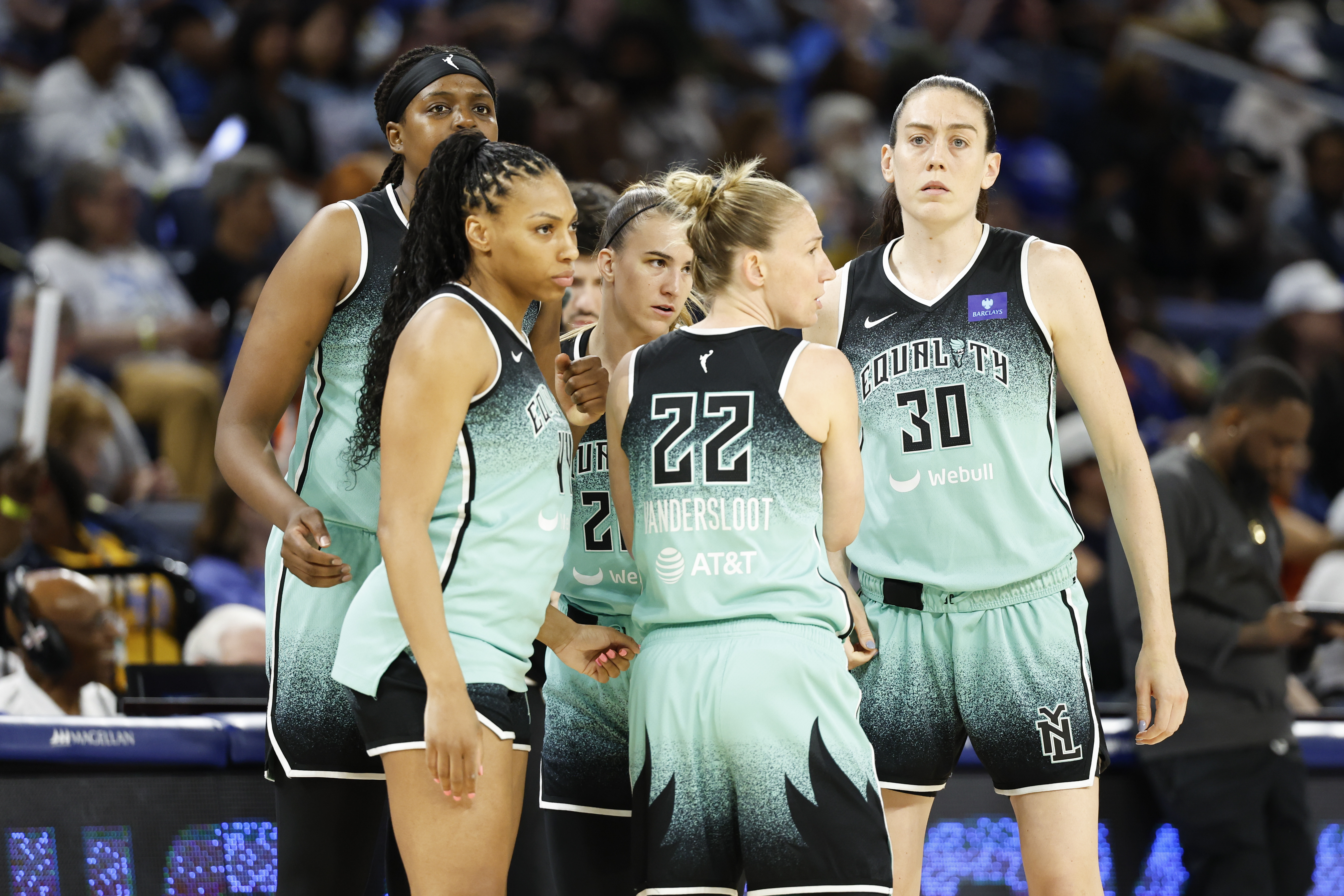 New York Liberty players look on as we offer our best Sparks vs. Liberty prediction and expert picks for Thursday's WNBA game at Barclays Center in Brooklyn, N.Y.