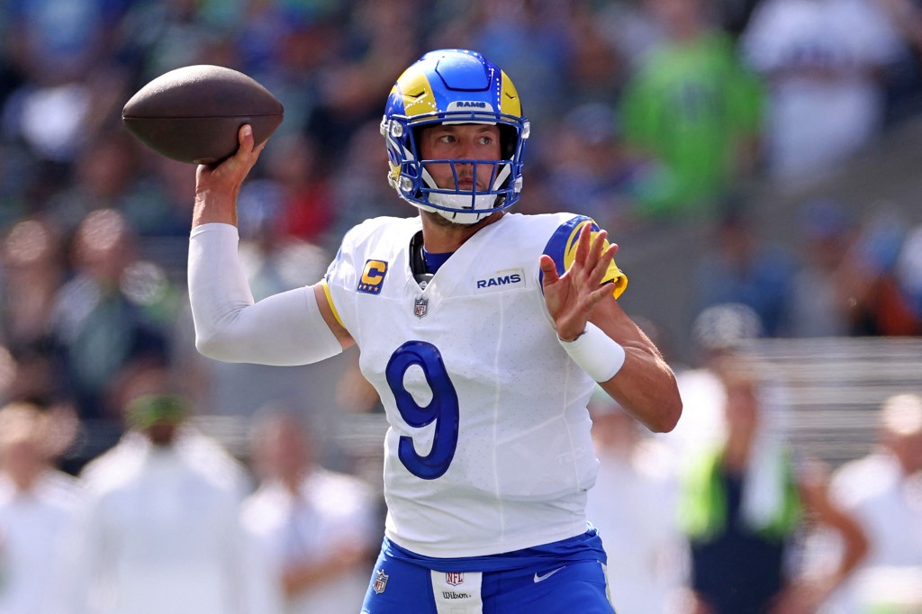 Matthew Stafford of the Los Angeles Rams attempts a pass against the Seattle Seahawks as we look at our Rams-Bengals player props for MNF.