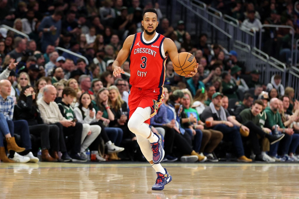 CJ McCollum of the New Orleans Pelicans handles the ball during a game against the Milwaukee Bucks at Fiserv Forum as we look at our Thunder-Pelicans Game 3 player props and expert picks based on the best NBA odds.