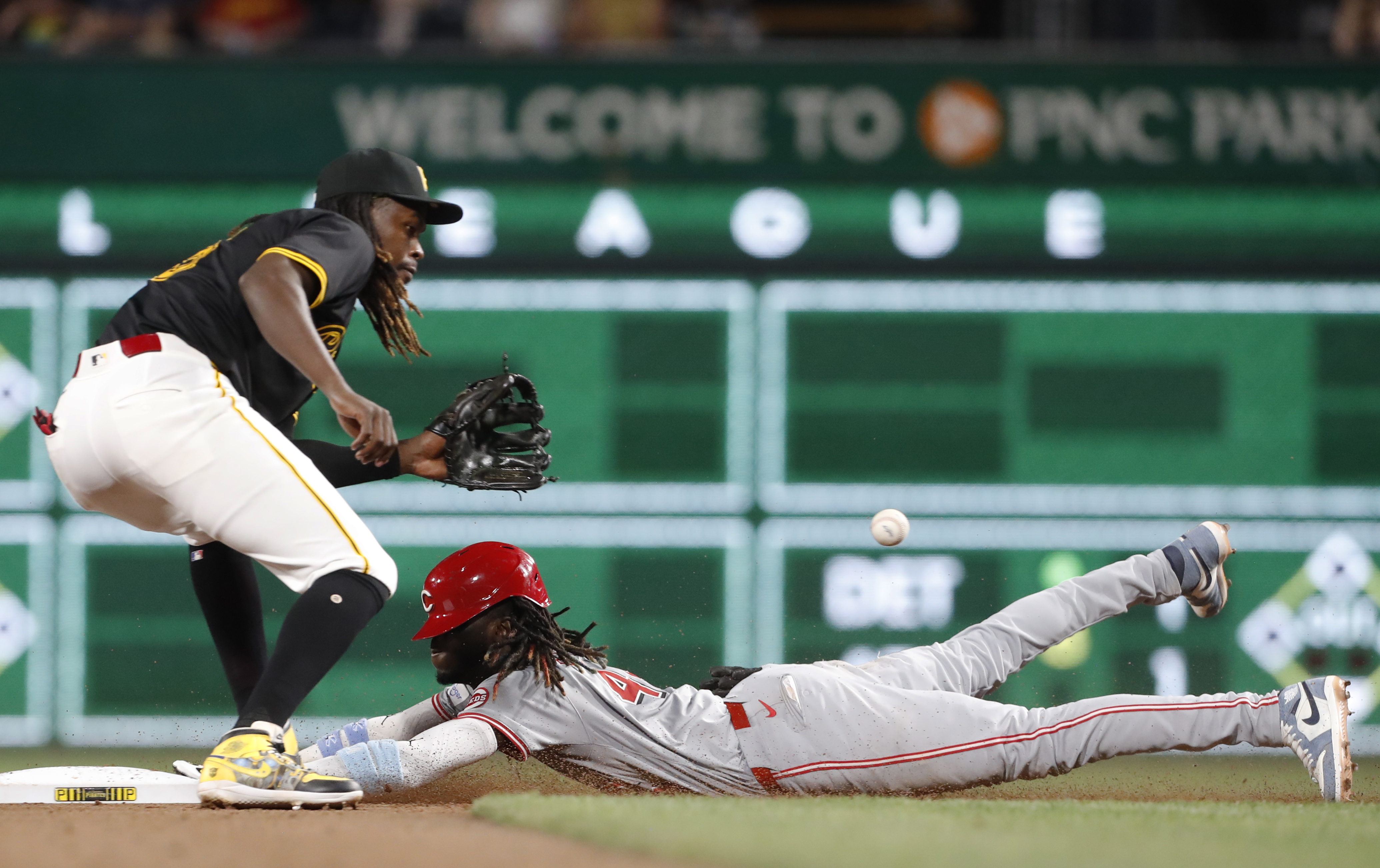 Cincinnati Reds shortstop Elly De La Cruz steals second base as Pittsburgh Pirates shortstop Oneil Cruz takes a late throw during the eighth inning at PNC Park. We're backing De La Cruz in our MLB Player Props.