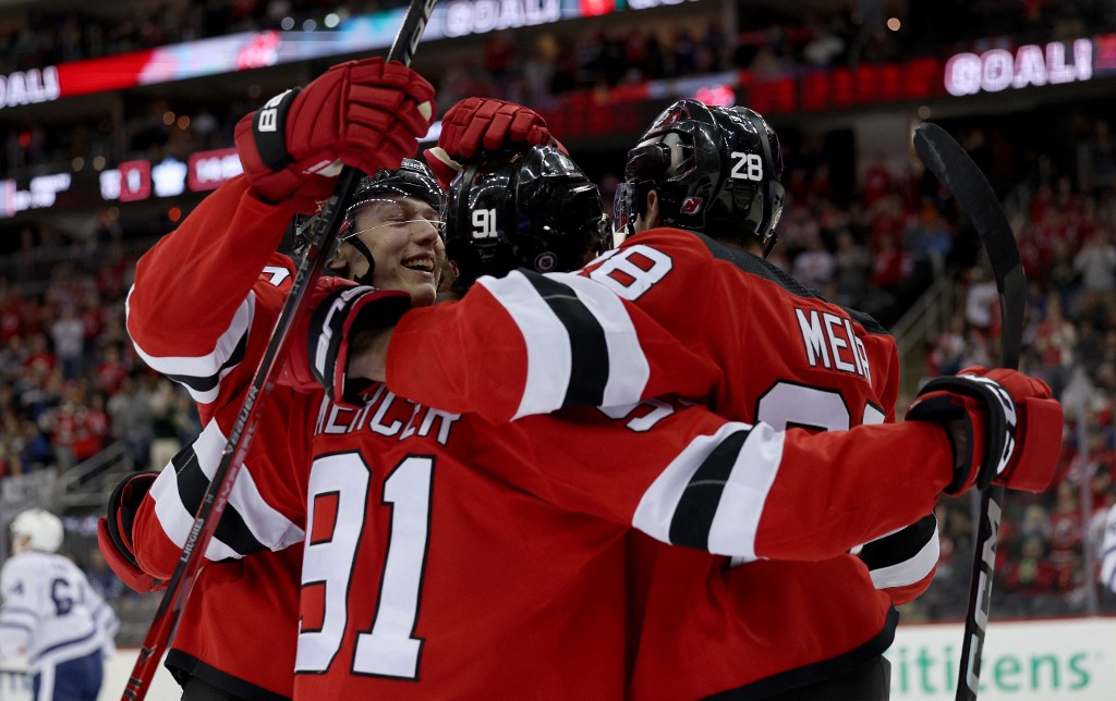 Dawson Mercer of the New Jersey Devils is congratulated as we look at the New Jersey sports betting financials for April 2024