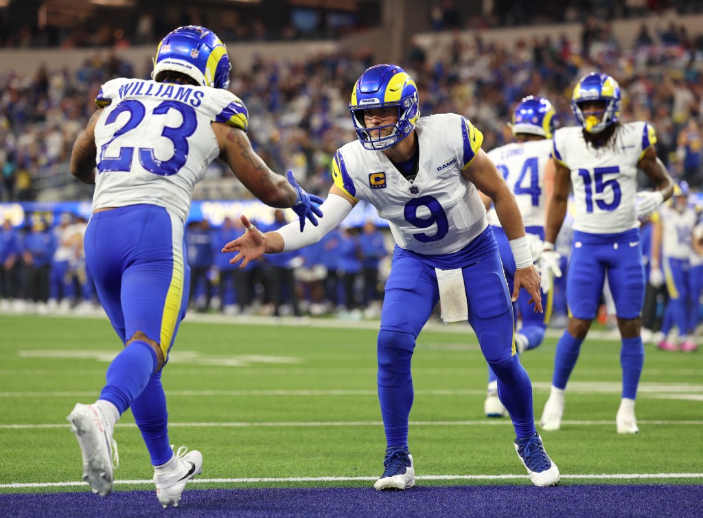 Matthew Stafford #9 of the Los Angeles Rams celebrates with Kyren Williams #23 as we make our Saints vs. Rams NFL player props for Thursday Night Football.