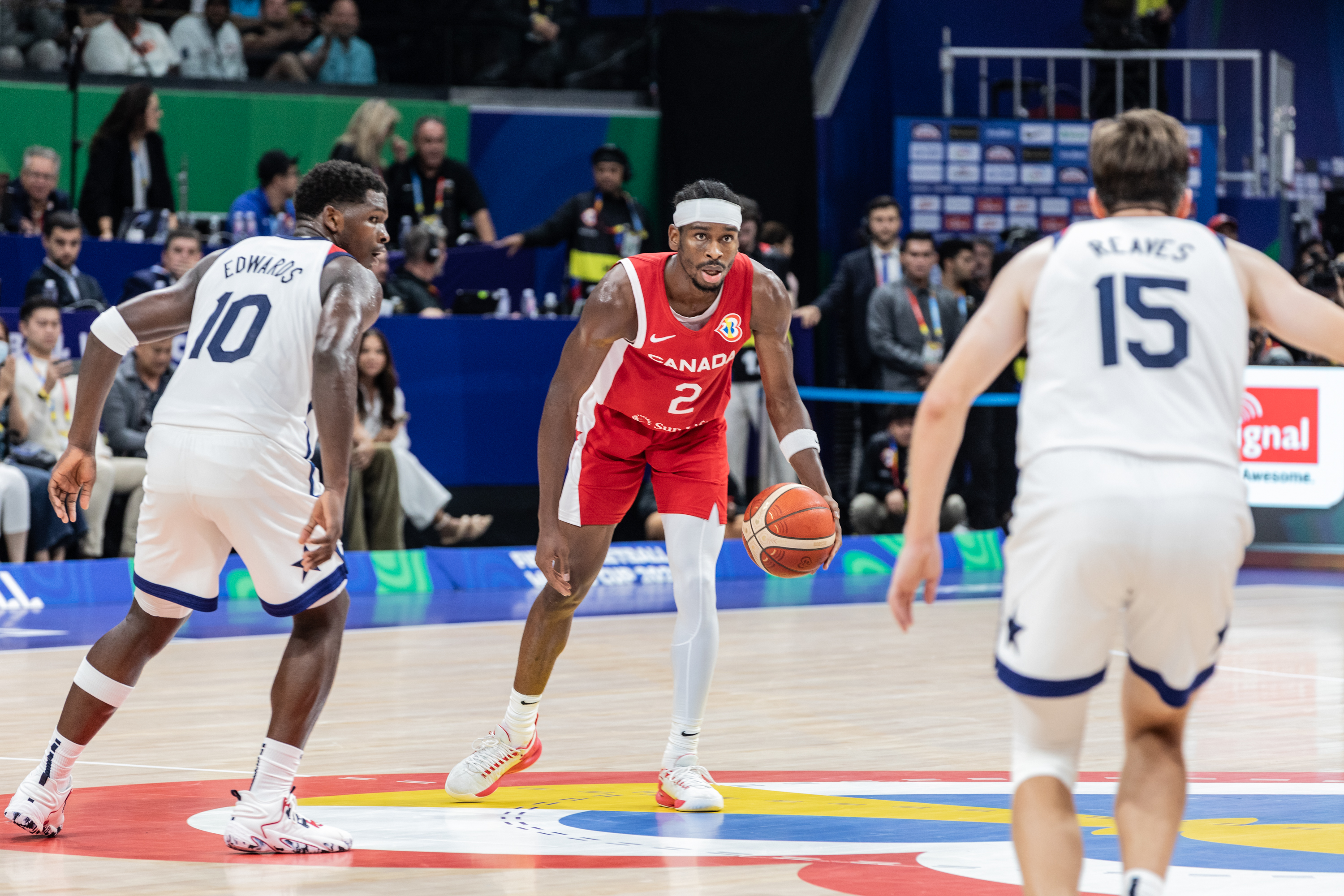 Shai Gilgeous-Alexander of Canada and Anthony Edwards and Austin Reaves of the United States seen in action as we offer our best USA vs. Canada prediction and odds for Wednesday's Olympic exhibition in Las Vegas.