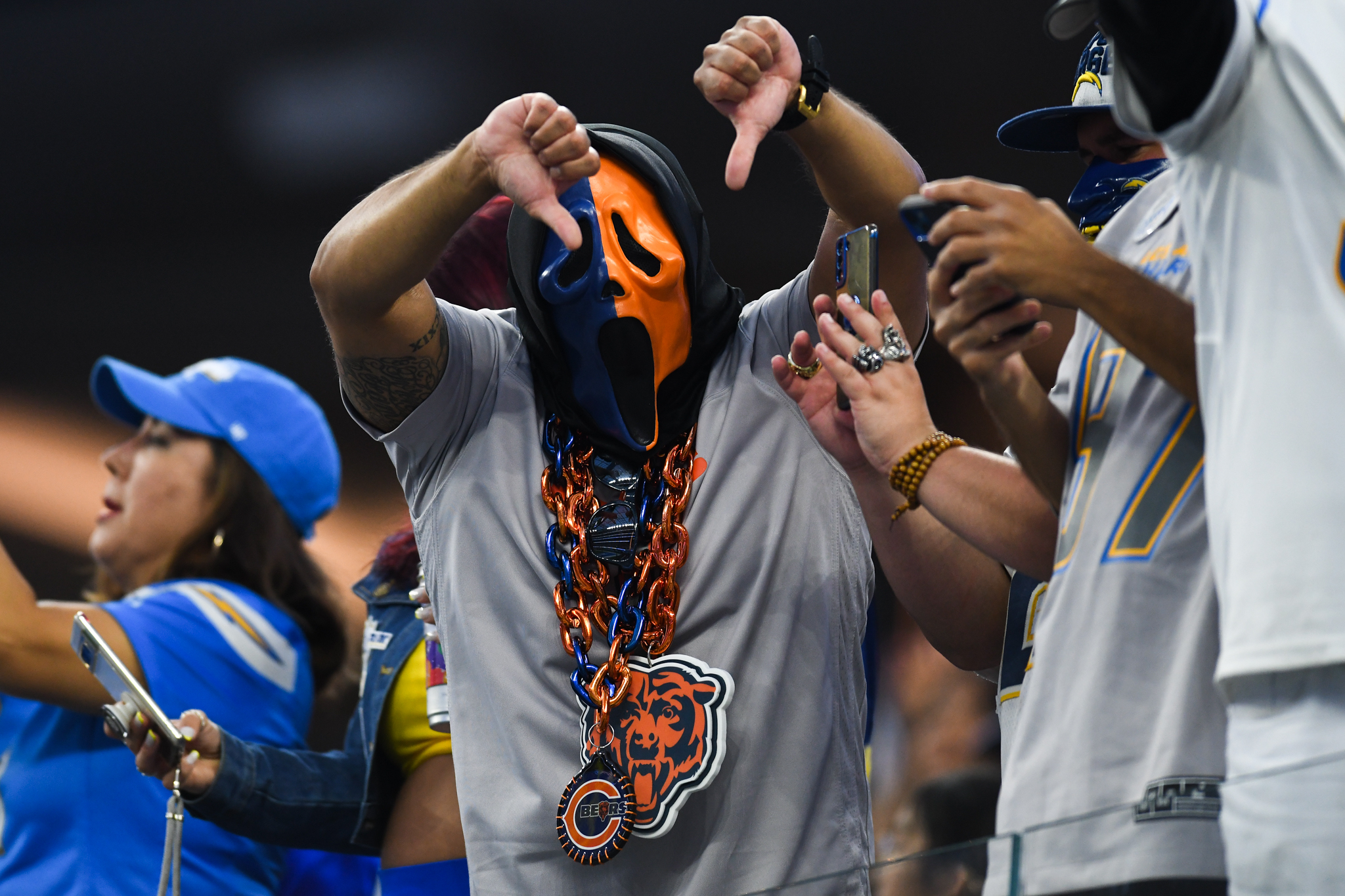 Chicago Bears fan is upset after the Los Angeles Chargers score a touchdown against the Chicago Bears during the first quarter at SoFi Stadium.