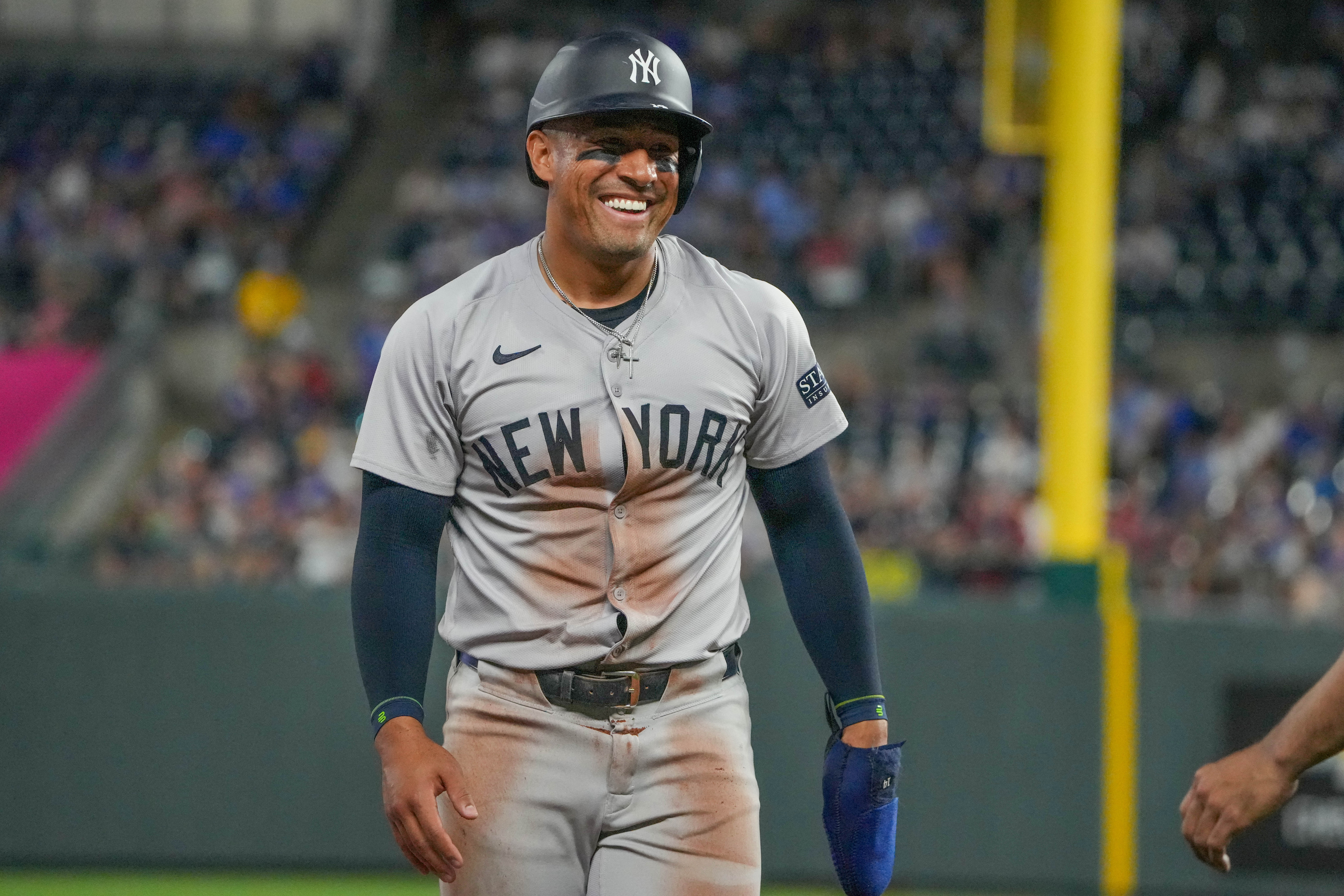 New York Yankees right fielder Jahmai Jones laughs after tripping while running to third base as we look at New York sportsbook financials for May 2024