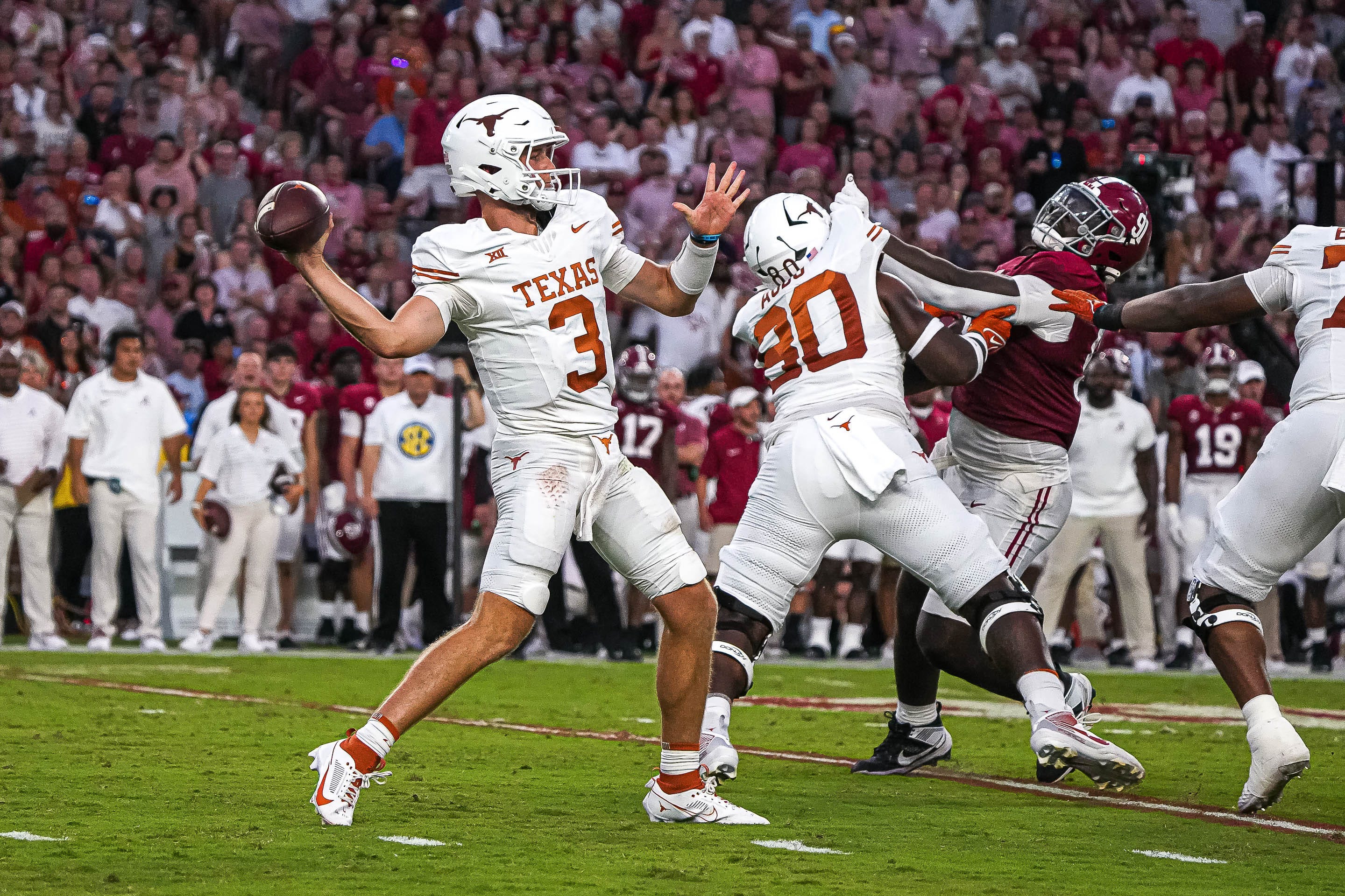 Texas Longhorns quarterback Quinn Ewers throws a pass during the game against Alabama at Bryant-Denny Stadium. Texas is among the favorites by the SEC Championship odds.