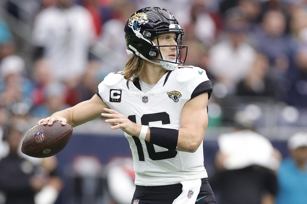 Trevor Lawrence #16 of the Jacksonville Jaguars looks to pass as we offer our Trevor Lawrence NFL player props for MNF