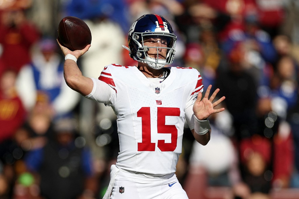 Tommy DeVito of the New York Giants passes the ball during the first quarter against the Washington Commanders as we look at our Giants-Eagles prediction.