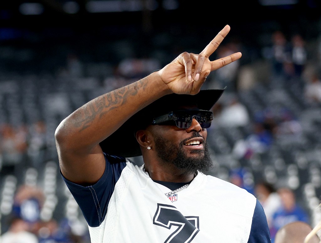 Former Dallas Cowboys wide receiver Dez Bryant walks on the field before the game between the New York Giants and the Dallas Cowboys at MetLife Stadium on September 26, 2022 in East Rutherford, New Jersey.