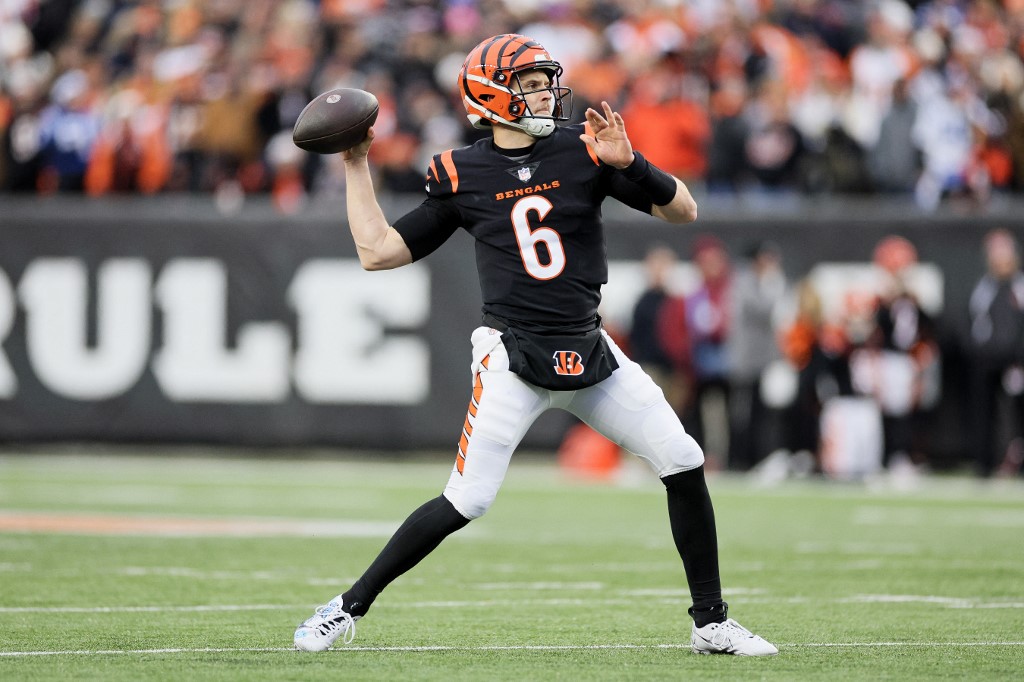 Jake Browning of the Cincinnati Bengals throws a pass as we share our best Vikings vs. Bengals prediction.