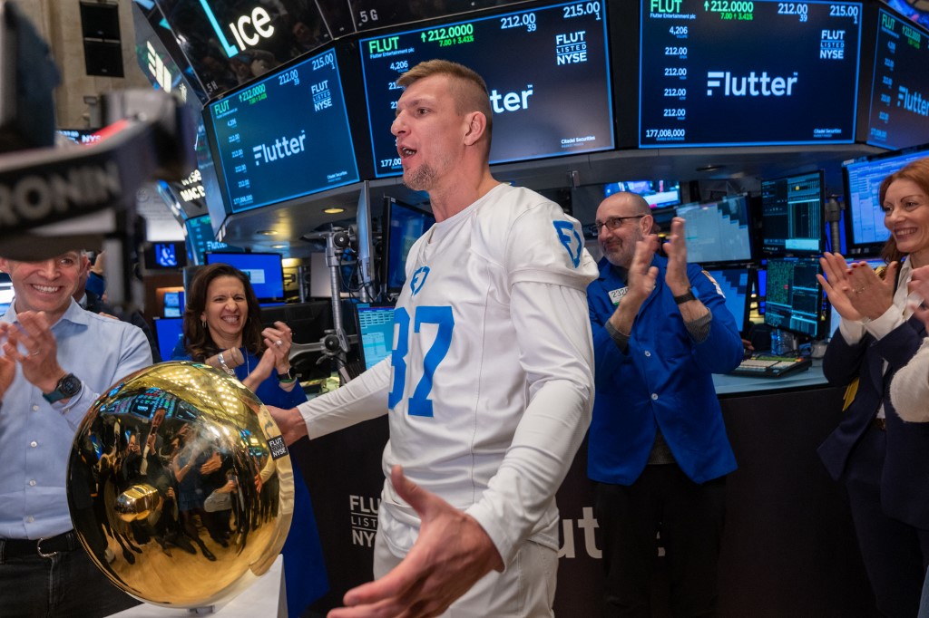 Former NFL tight end Rob Gronkowski celebrates the IPO of Flutter Entertainment, the parent company of FanDuel, as we take a look at the latest news regarding Flutter moving its primary listing to the NYSE.
