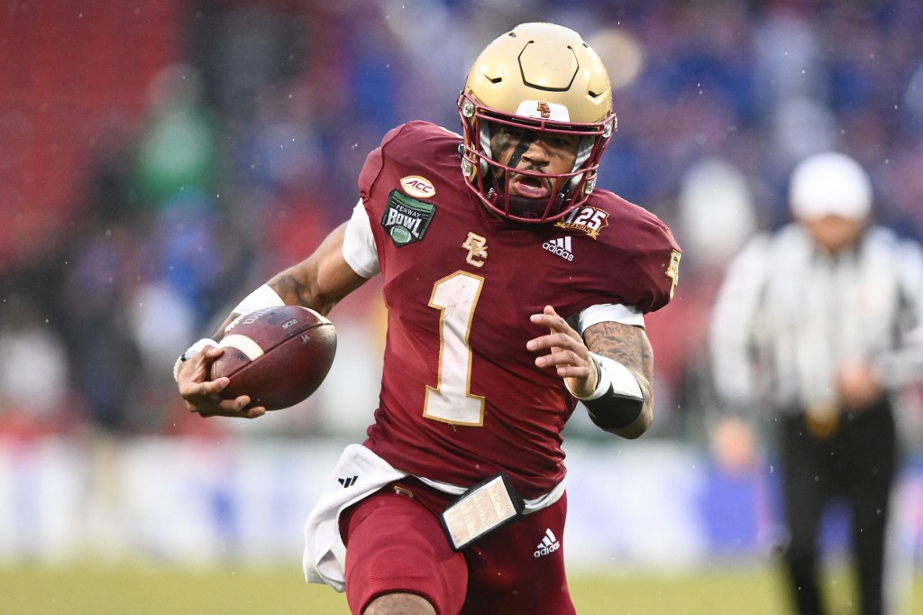 Thomas Castellanos of the Boston College Eagles rushes against the Southern Methodist Mustangs as we look at Fanatics Underscoregs fine for violating college football betting laws in Massachusetts.