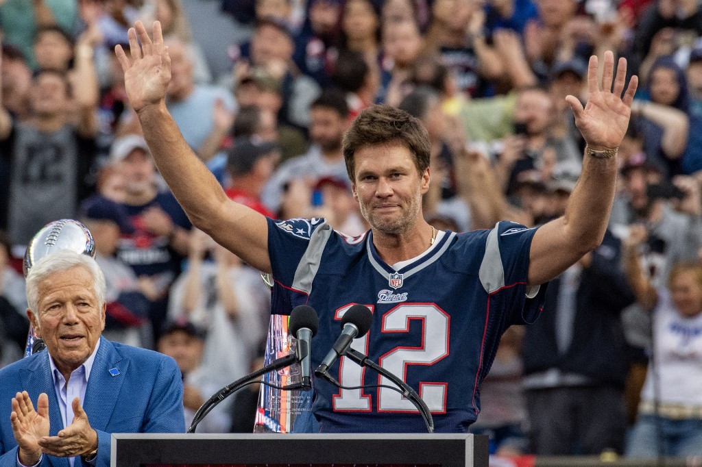 Former New England Patriots quarterback Tom Brady gestures as we look at our Tom Brady next team odds.