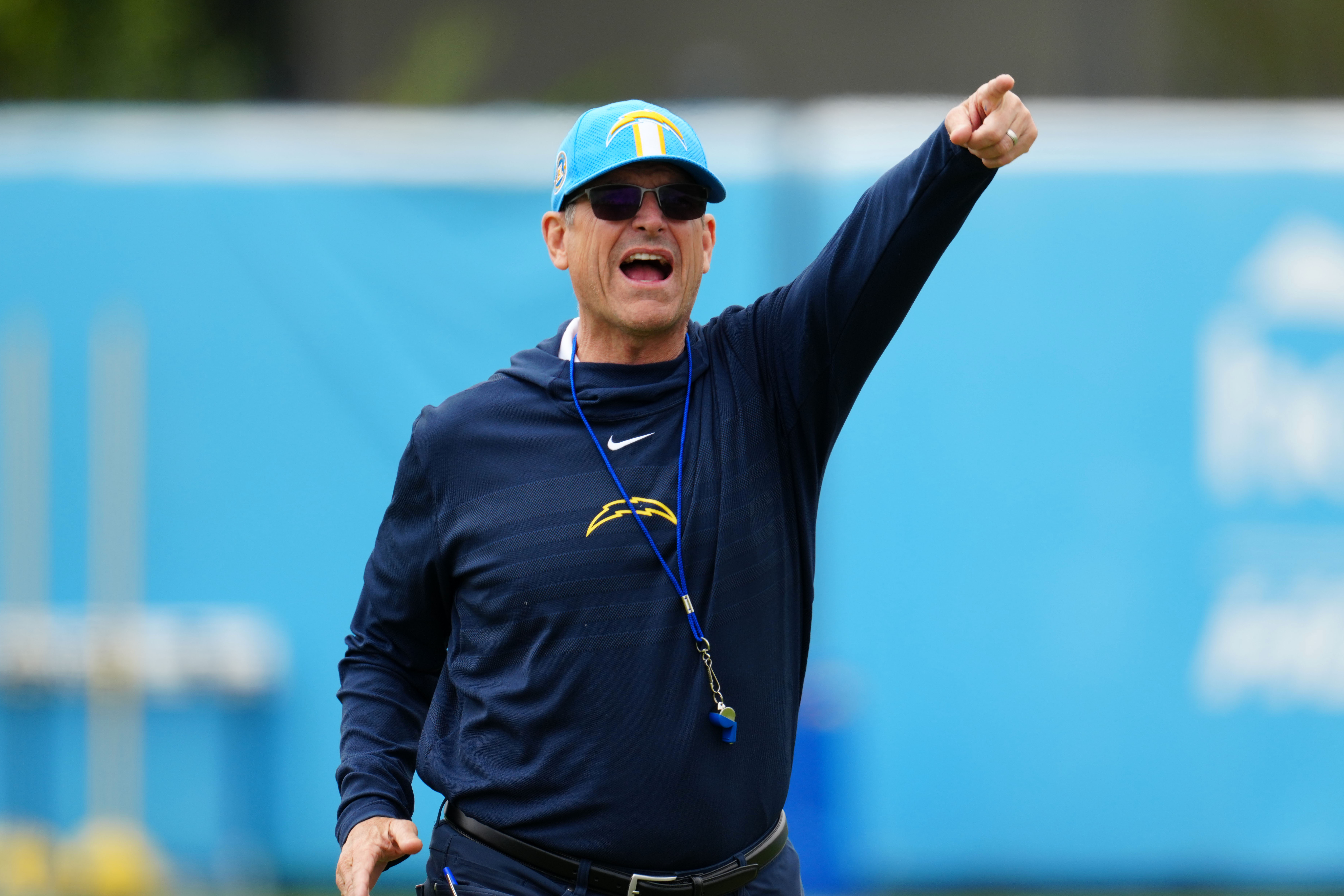 Los Angeles Chargers coach Jim Harbaugh reacts during organized team activities at the Hoag Performance Center. Harbaugh is among the favorites by the NFL Coach of the Year Odds.