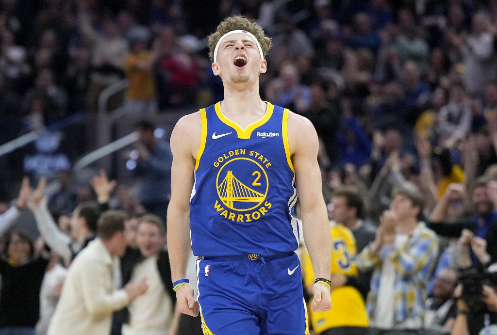 Brandin Podziemski #2 of the Golden State Warriors reacts after making a three-point shot as we look at California's latest move toward a legal sports betting platform
