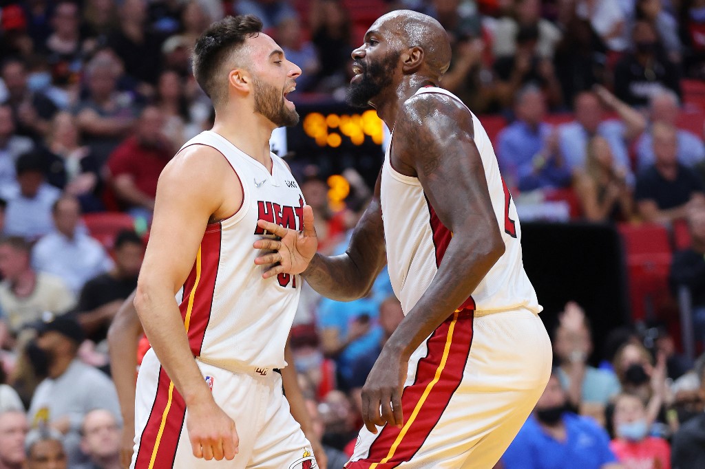 Max Strus, left, and Dwayne Dedmon return to a Heat team that saw very little offseason roster turnover. (Michael Reaves / GETTY IMAGES NORTH AMERICA / Getty Images via AFP)