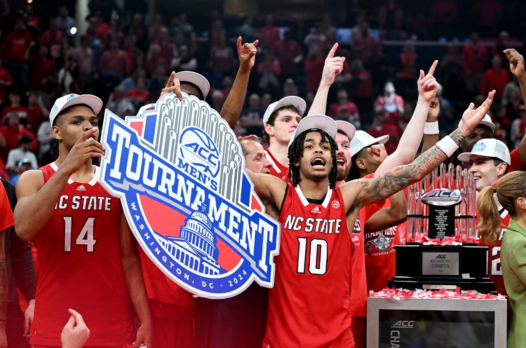 The North Carolina State Wolfpack celebrate after winning the Championship Game of the ACC Men's Basketball Tournament.