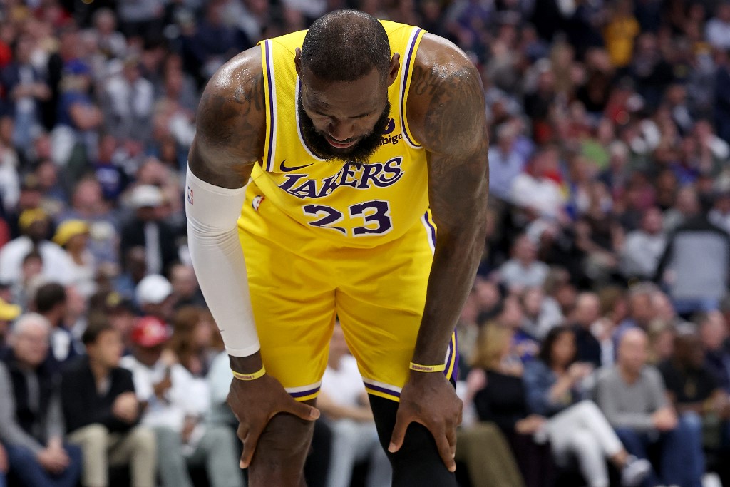 LeBron James (23) of the Los Angeles Lakers gathers himself as we explore the latest LeBron James next team odds and predict where he might sign in NBA free agency ahead of the 2024-25 season.