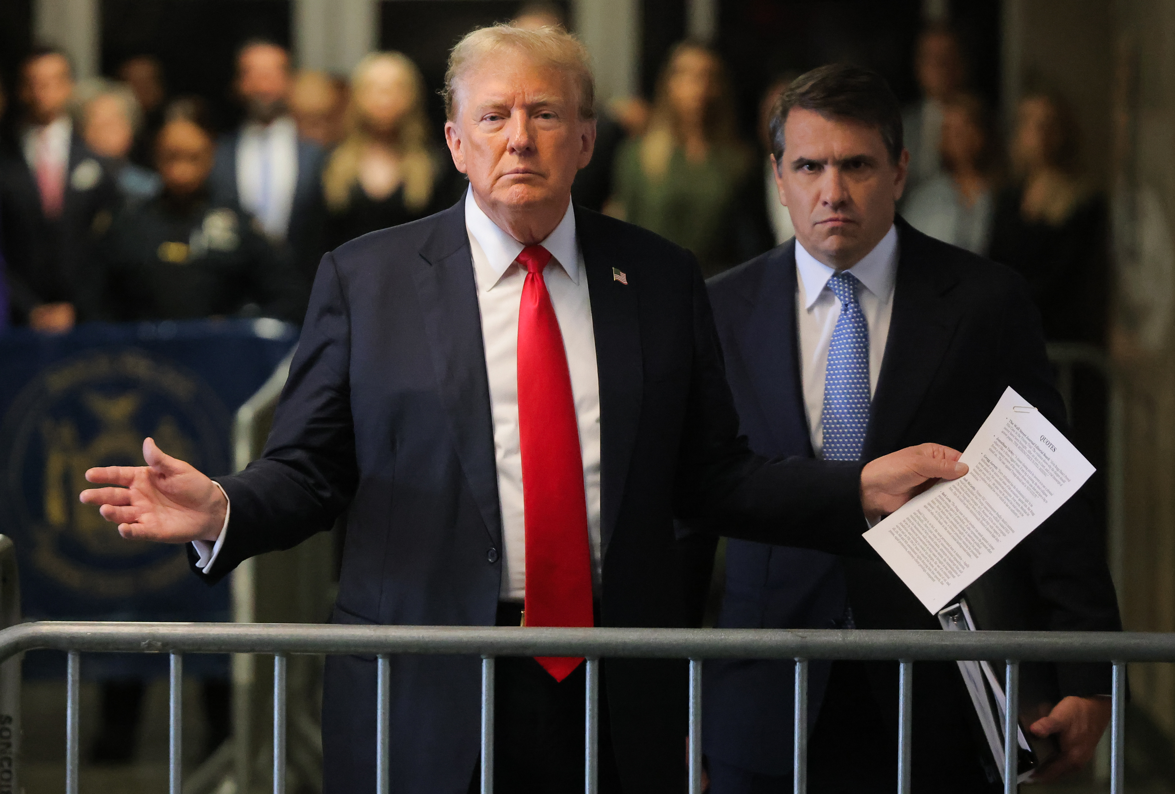 Former President Donald Trump speaks to the media while his lawyer Todd Blanche listens after he arrives at court before closing arguments for his criminal trial at Manhattan criminal court as we look at the Republican presidential odds.