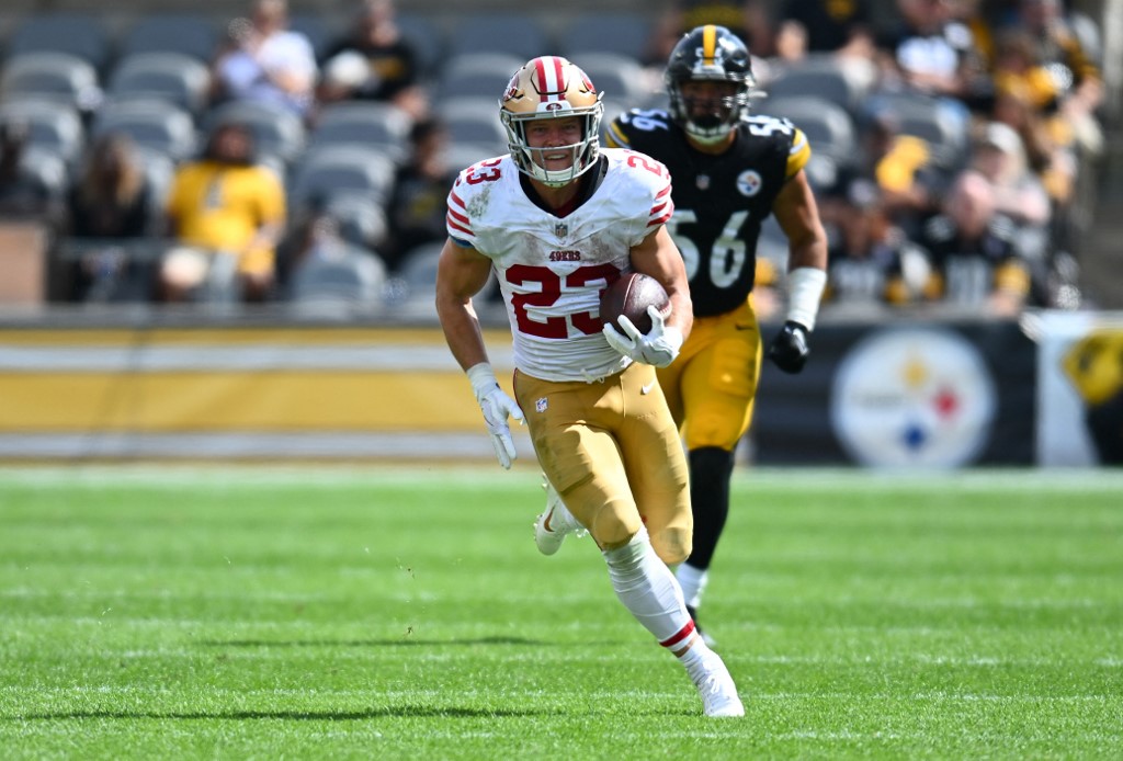 San Francisco 49ers running back Christian McCaffrey runs as we look at the best NFL Week 5 odds and lines