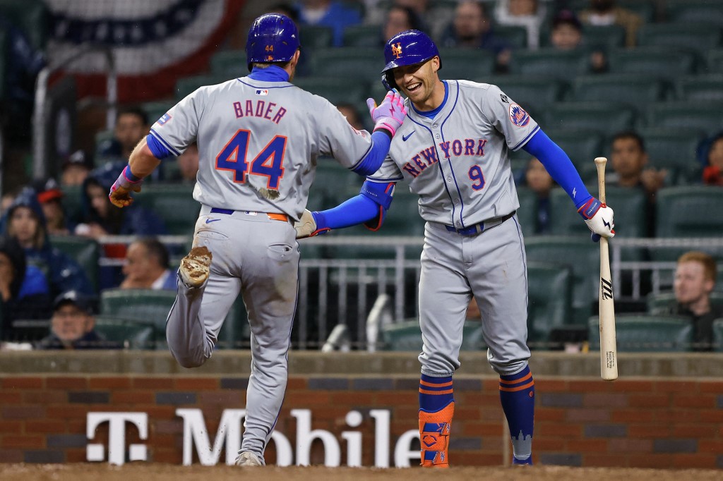 Brandon Nimmo #9 celebrates with Harrison Bader #44 of the New York Mets as we look at the New York sports betting scene March 2024 financials