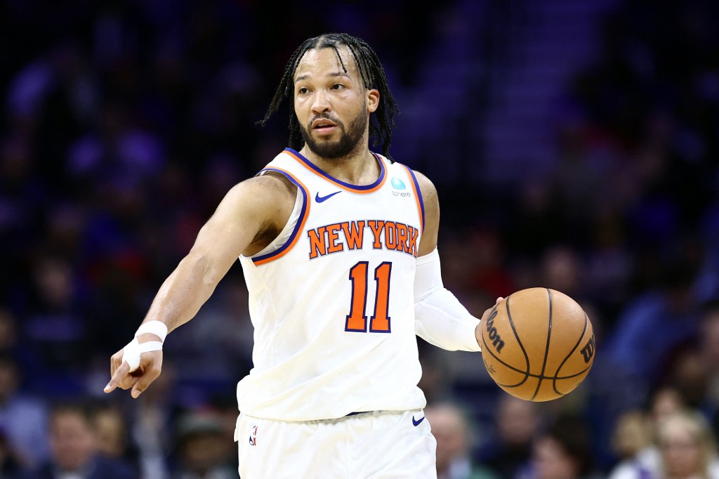 Jalen Brunson of the New York Knicks dribbles during the third quarter against the Philadelphia 76ers at the Wells Fargo Center as we look at our Celtics-Knicks promo code for BetRivers.
