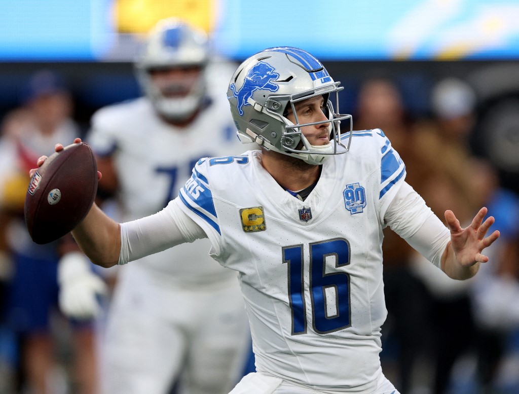 Jared Goff #16 of the Detroit Lions passes as we look at our Jared Goff NFL player prop predictions for the Bears vs. Lions Week 11 NFL matchup