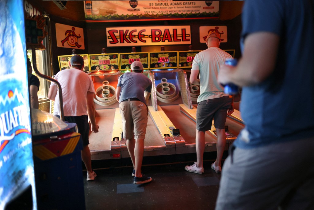 Baseball fans play Skee-Ball as we detail Dave & Buster's allowing betting on arcade games in partnership with Lucra.