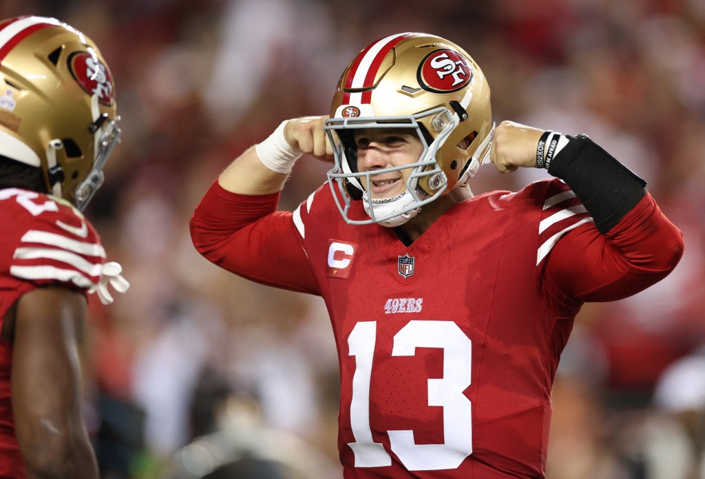 Brock Purdy of the San Francisco 49ers celebrates after a touchdown as we look at the best Brock Purdy player props for Ravens vs. 49ers.